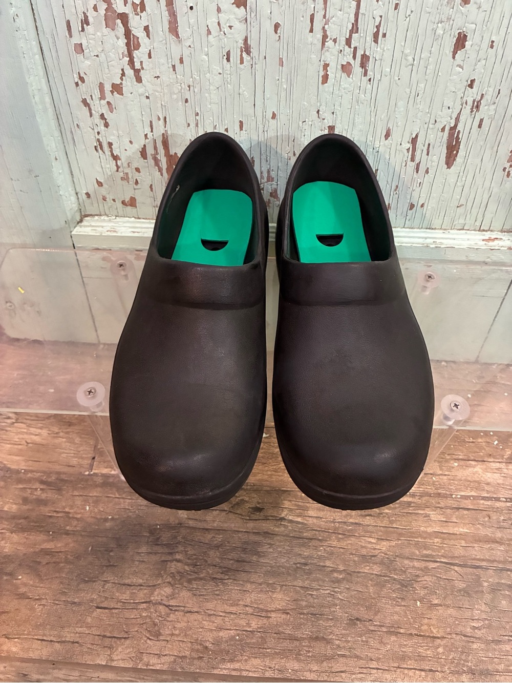 Crocs Women’s Black Slip-On Clogs with green Insoles